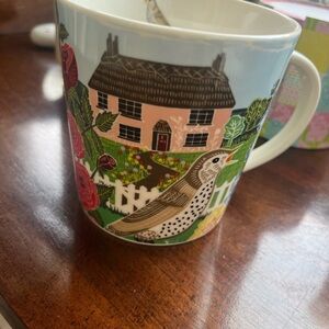 mug featuring an illustration by British printmaker and designer Kate Heiss.